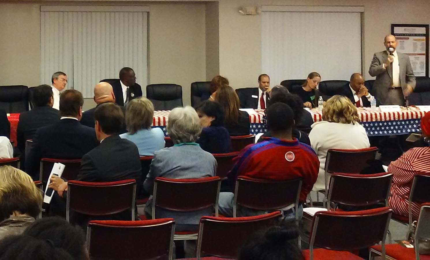 State House candidate Jim Young (right) and US House candidate Gregory Creswell (left) with others at candidate forum